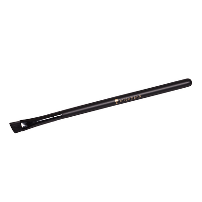 ElleeBRUSH Angle Tip tool with angled synthetic bristles, designed for precise eyebrow tinting, sharp line creation, and gentle lotion removal during lash lifts and laminations.