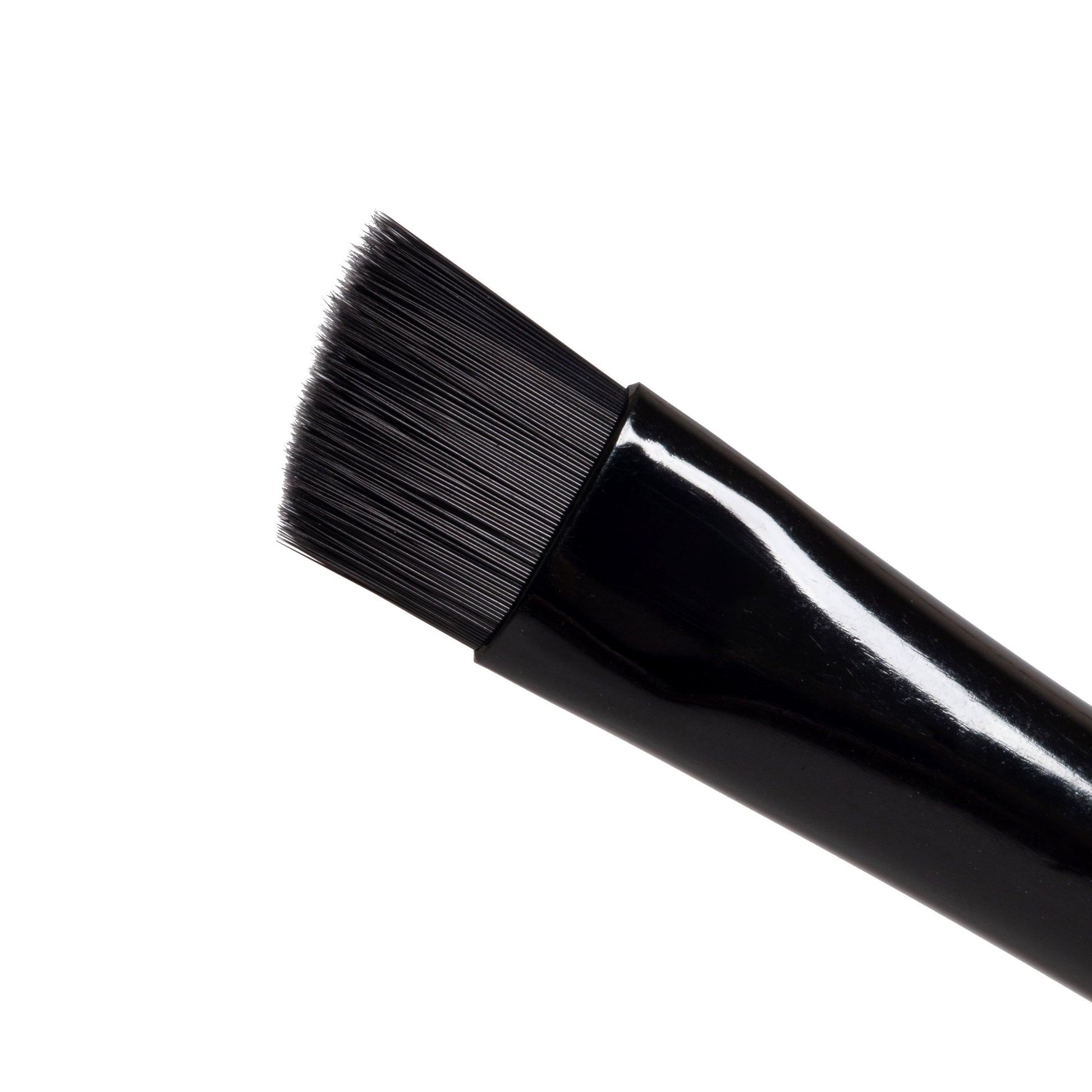 ElleeBRUSH Angle Tip tool with angled synthetic bristles, designed for precise eyebrow tinting, sharp line creation, and gentle lotion removal during lash lifts and laminations.