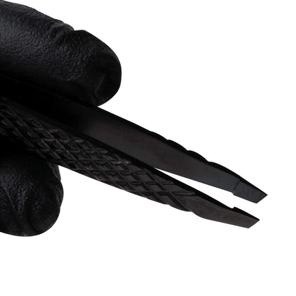 Professional Elleebana Ellee-Brow tweezers featuring a diamond grip and light tension design, presented in a protective ziplock storage case.