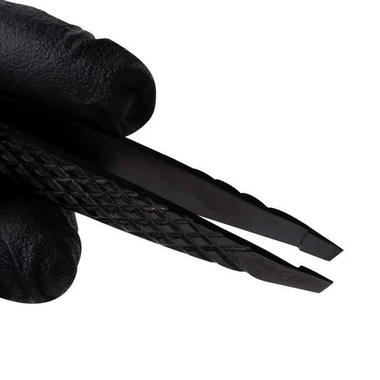 Professional Elleebana Ellee-Brow tweezers featuring a diamond grip and light tension design, presented in a protective ziplock storage case.