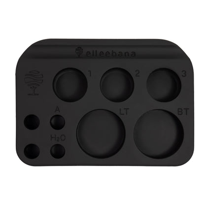 Multi-section Elleebana Ellee-PALETTE made of heat-safe, non-slip silicone with dedicated wells for lift lotions, tints, adhesives, and brushes for lash and brow treatments.