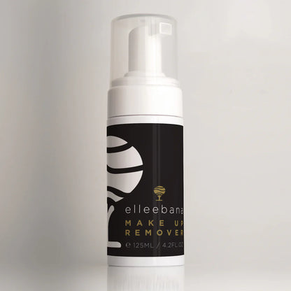 Bottles of Elleebana foaming lash and brow cleanser with pop-art style label design for professional prep and salon retail.