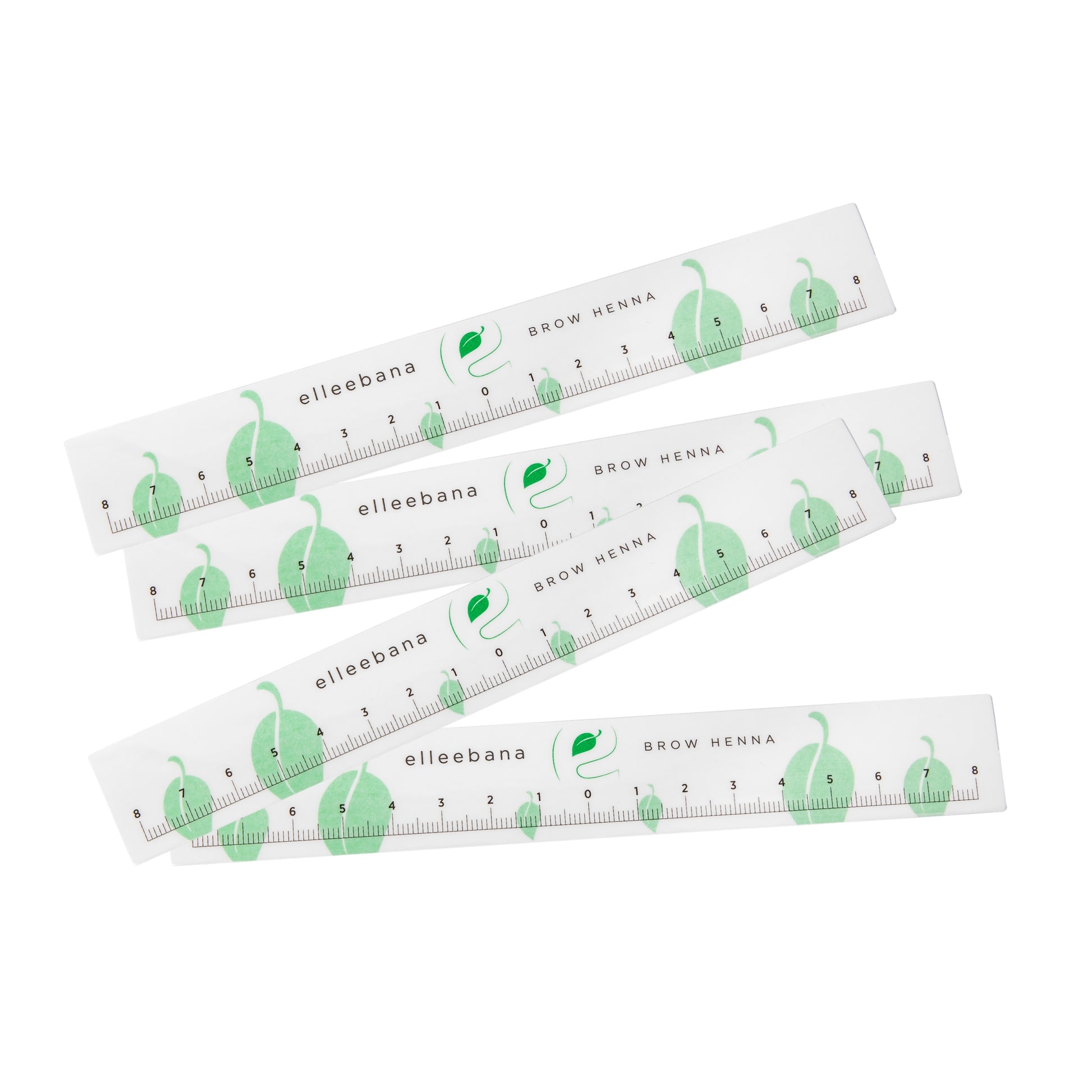 Roll of clear self-adhesive ruler stickers designed for accurate eyebrow mapping and ensuring symmetrical measurements during PMU, microblading, and brow styling procedures.