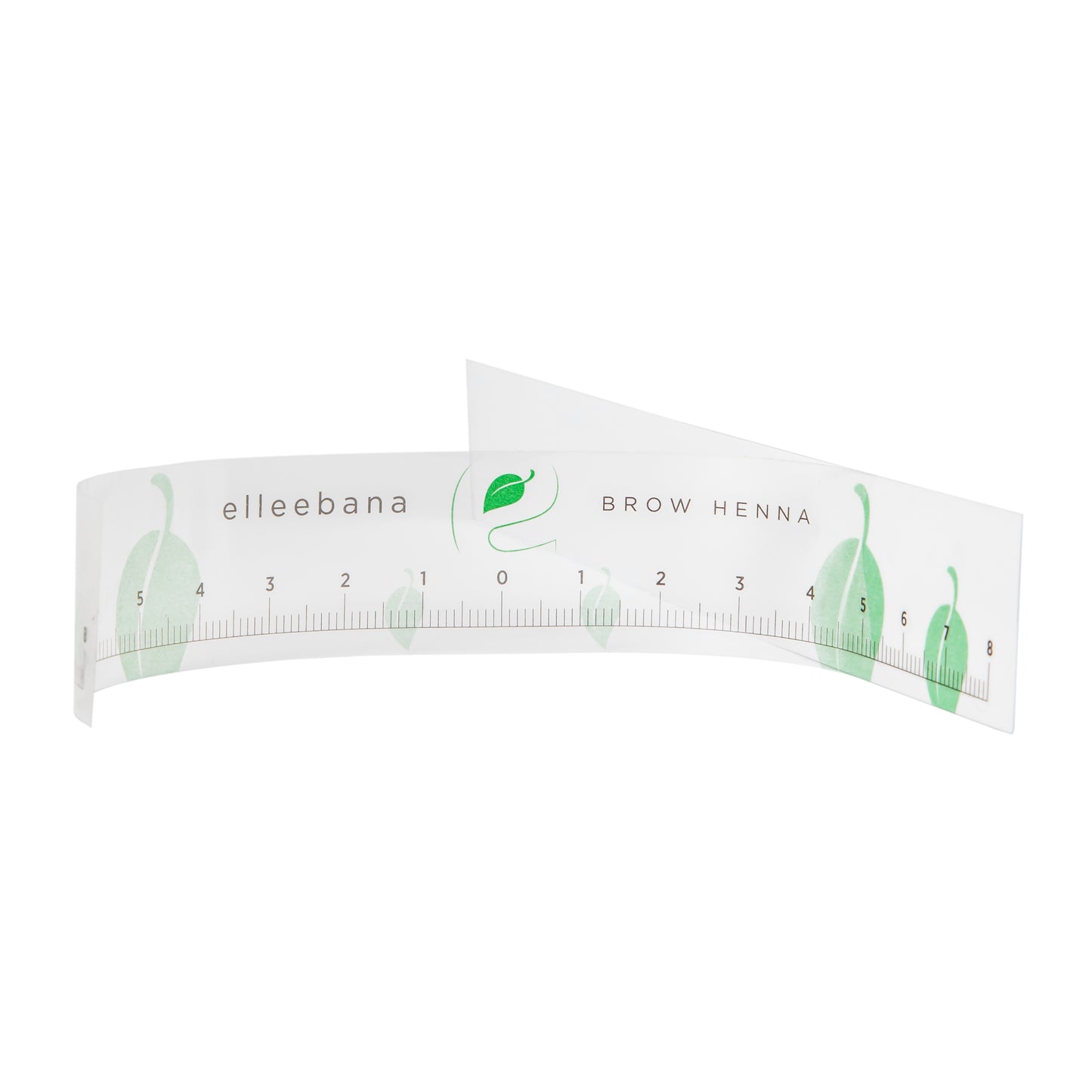 Roll of clear self-adhesive ruler stickers designed for accurate eyebrow mapping and ensuring symmetrical measurements during PMU, microblading, and brow styling procedures.