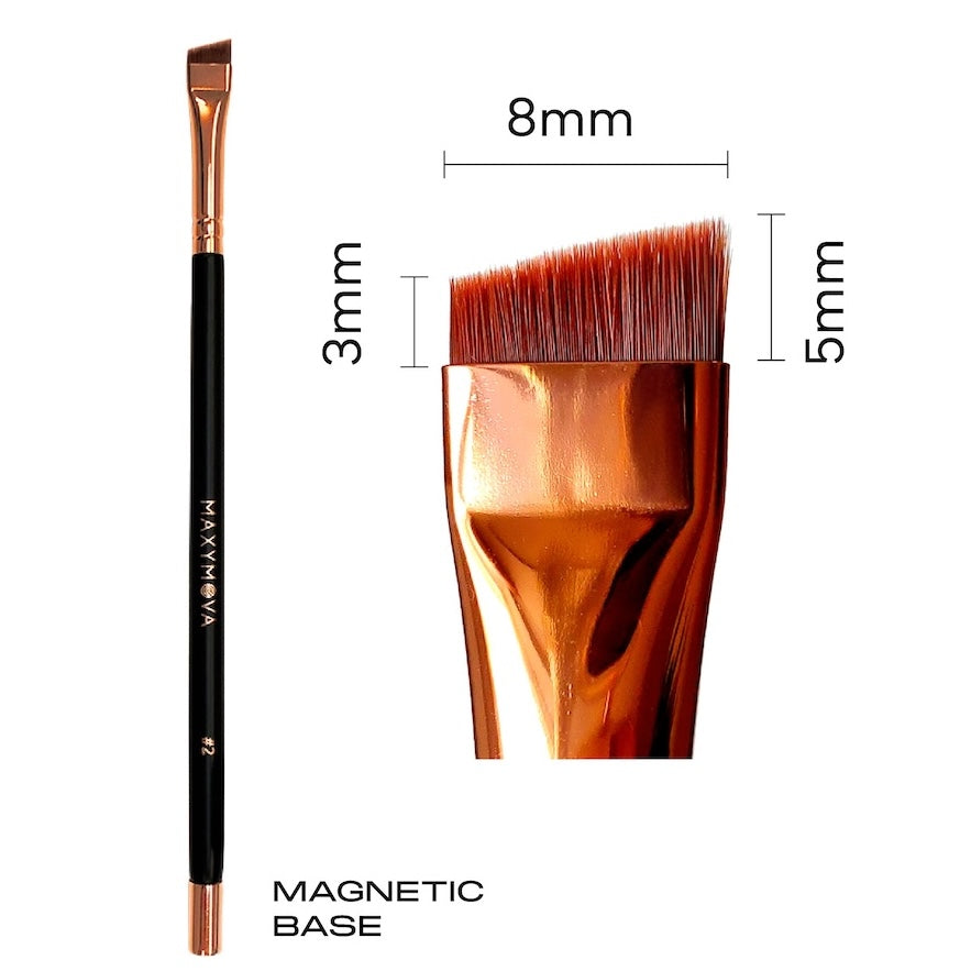 Wide angled synthetic beauty brush with a wooden handle, brass ferrule, and a magnetic base.
