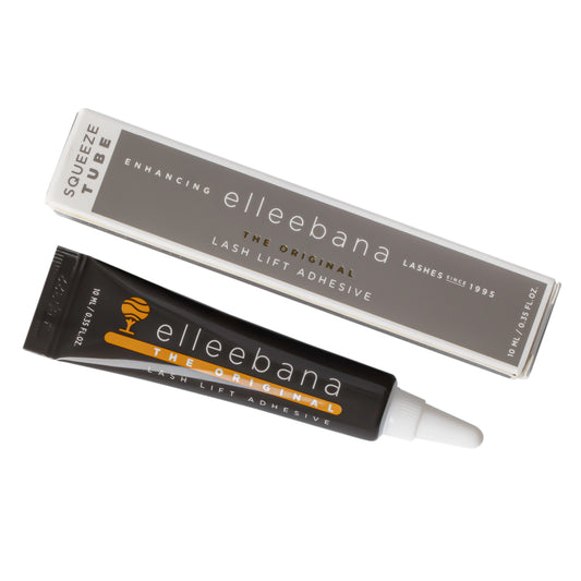 Flexible 10ml squeeze tube of clear original Elleebana lash lift adhesive with black cap on a plain studio background.
