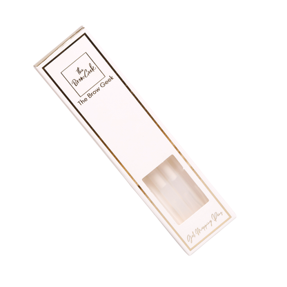 Fine-tip white gel pen creating clean, precise mapping lines on skin for eyebrow symmetry and shaping prep.