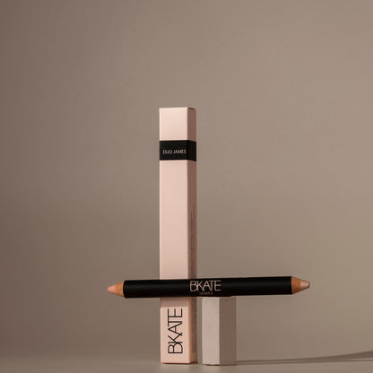 Dual-ended B'KATE brow highlighter pencil featuring a matte lifting shade and a shimmering champagne highlight, formulated as vegan and cruelty-free for brow bone enhancement.