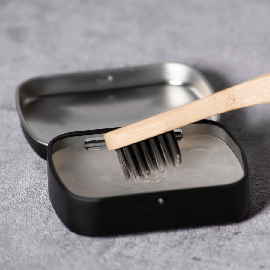 B'KATE ecological bamboo eyebrow brush with compact bristles designed for applying brow soap or puff products to shape full, fluffy eyebrows.