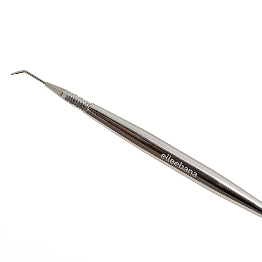 Fine-tip stainless steel lash lift isolator tool featuring a textured "bling" handle design, engineered for precise lash isolation and separation during lash lifting services.