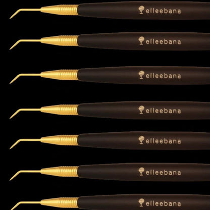 Dual-ended Elleebana Precision Lifter tool featuring a 16-tooth Japanese stainless-steel comb head and an angled precision isolation tip.