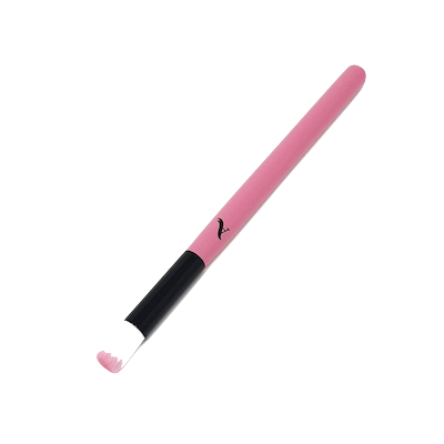 Soft pink lash cleansing brush with dense, fine bristles designed for gentle eyelash extension hygiene and daily client aftercare.