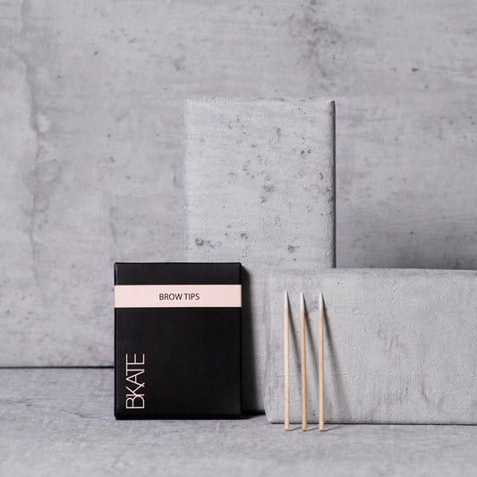 Pack of 100 fine wooden applicator sticks designed for accurate application, corrections, and clean-up during eyebrow dye, tint, or henna treatments.